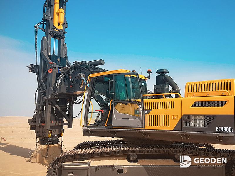 Rapid impact compaction rig on a sandy site