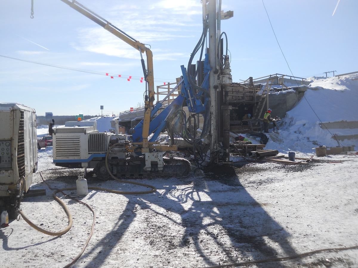 Compact drilling rig installing micro piles